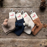 Garter Stitch Baby Booties With Pompoms | Lapis Lazuli