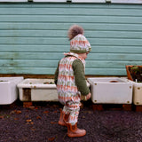 Carrot Row Long Romper