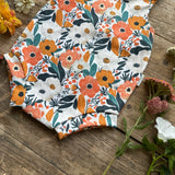 Clementine Blooms Bloomer Romper