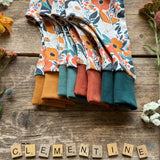 Clementine Blooms Footed Romper