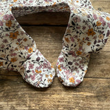 Petal Breeze Footed Romper