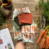 Carrot Row Footed Romper