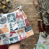 Coastal Stamps Knotted Hats