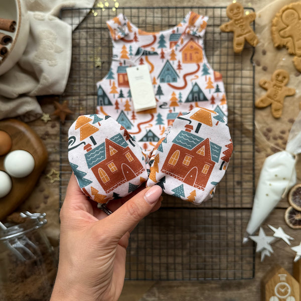 Gingerbread Village Footed Romper