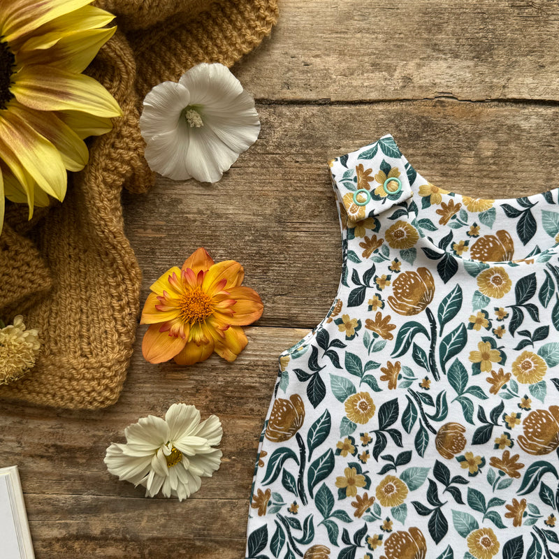 Sunlit Grove Footed Romper