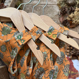 The Beetle Club Footed Romper